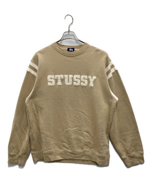 stussy（ステューシー）stussy (ステューシー) ワッペンロゴクルーネックスウェット ベージュ サイズ:不明の古着・服飾アイテム