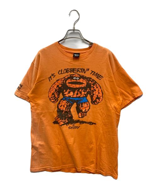 stussy（ステューシー）stussy (ステューシー) MARVEL (マーベル) The Thing Tee オレンジ サイズ:Mの古着・服飾アイテム