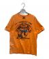 stussy（ステューシー）の古着「The Thing Tee」｜オレンジ