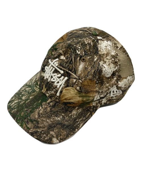 stussy（ステューシー）stussy (ステューシー) New Era (ニューエラ) 9TWENTY BASIC STRAPBACK REALTREE EDGE カーキの古着・服飾アイテム