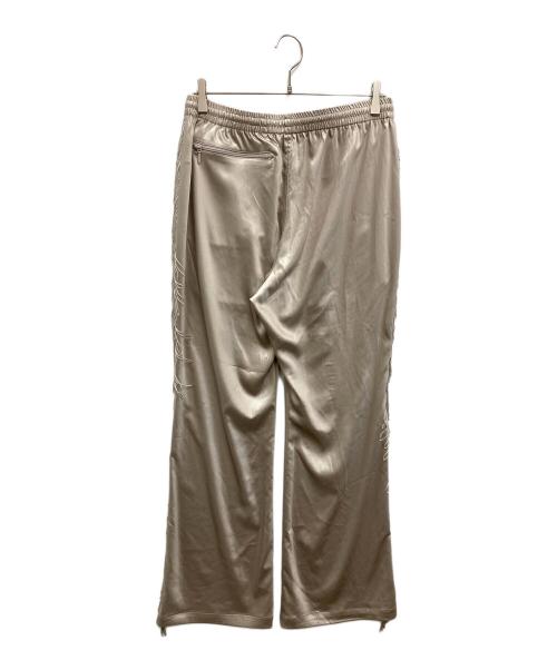 Needles（ニードルズ）Needles (ニードルズ) FRINGE BOOT-CUT TRACK PANT ベージュ サイズ:Mの古着・服飾アイテム