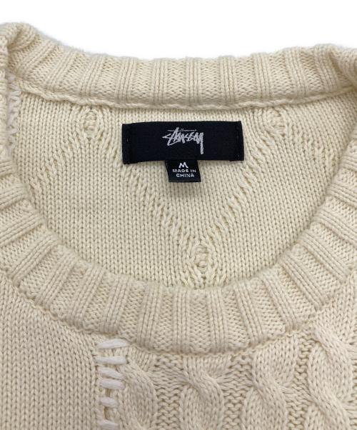 stussy（ステューシー）stussy (ステューシー) パッチワーク クルーネックニット アイボリー サイズ:Mの古着・服飾アイテム