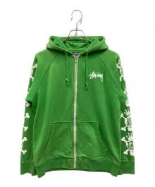 stussy（ステューシー）の古着「スカルクロスボーンプリントジップアップパーカー」｜グリーン
