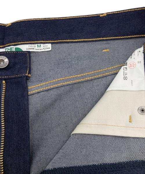 THE NORTH FACE（ザ ノース フェイス）THE NORTH FACE (ザ ノース フェイス) COMME des GARCONS JUNYA WATANABE MAN (コムデギャルソンジュンヤワタナベマン) バックロゴ プリント デニムパンツ インディゴ サイズ:M 未使用品の古着・服飾アイテム