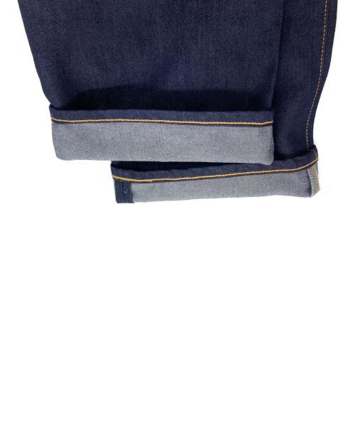 THE NORTH FACE（ザ ノース フェイス）THE NORTH FACE (ザ ノース フェイス) COMME des GARCONS JUNYA WATANABE MAN (コムデギャルソンジュンヤワタナベマン) バックロゴ プリント デニムパンツ インディゴ サイズ:M 未使用品の古着・服飾アイテム