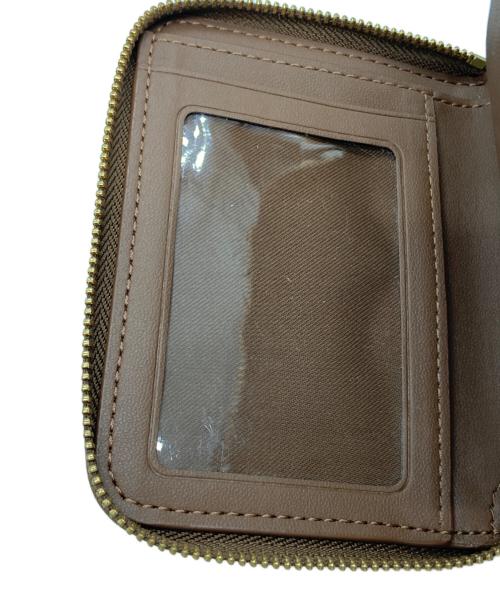 COACH（コーチ）COACH (コーチ) PEANUTS (ピーナッツ) 2つ折り財布 ブラウンの古着・服飾アイテム