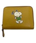 COACH×PEANUTSコーチ×ピーナッツ）の古着「2つ折り財布」｜イエロー