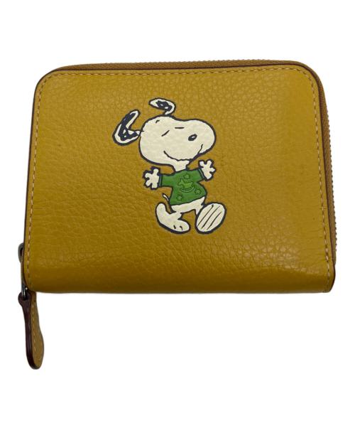 COACH（コーチ）COACH (コーチ) PEANUTS (ピーナッツ) 2つ折り財布 イエローの古着・服飾アイテム