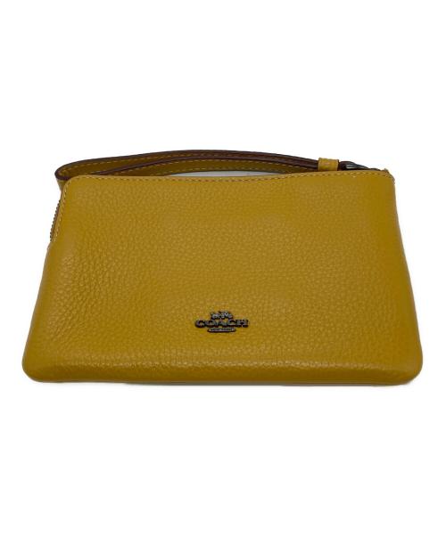 COACH（コーチ）COACH (コーチ) PEANUTS (ピーナッツ) スヌーピーコラボ ポーチ イエローの古着・服飾アイテム