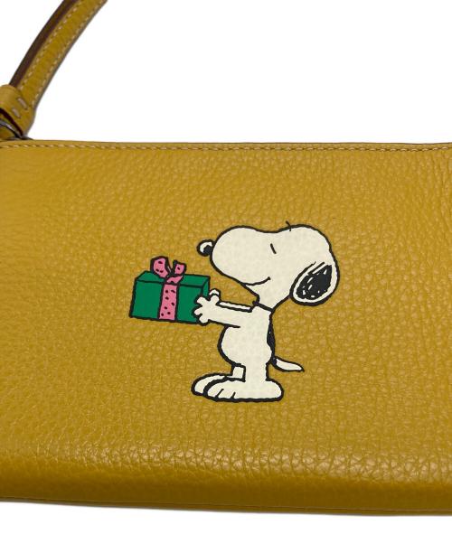 COACH（コーチ）COACH (コーチ) PEANUTS (ピーナッツ) スヌーピーコラボ ポーチ イエローの古着・服飾アイテム