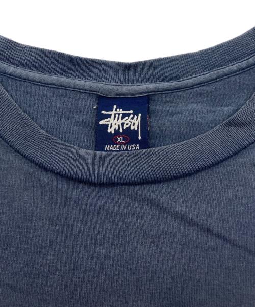 stussy（ステューシー）stussy (ステューシー) INTERNATIONAL SQUADRON プリントTシャツ ネイビー サイズ:XLの古着・服飾アイテム