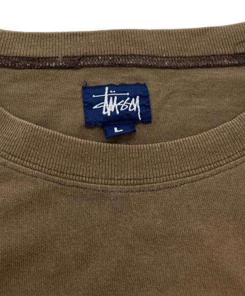 stussy（ステューシー）stussy (ステューシー) クロスボーンプリントレイヤードカットソー ブラウン×ホワイト サイズ:Lの古着・服飾アイテム