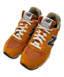 NEW BALANCE（ニューバランス）の古着「ローカットスニーカー」｜オレンジ