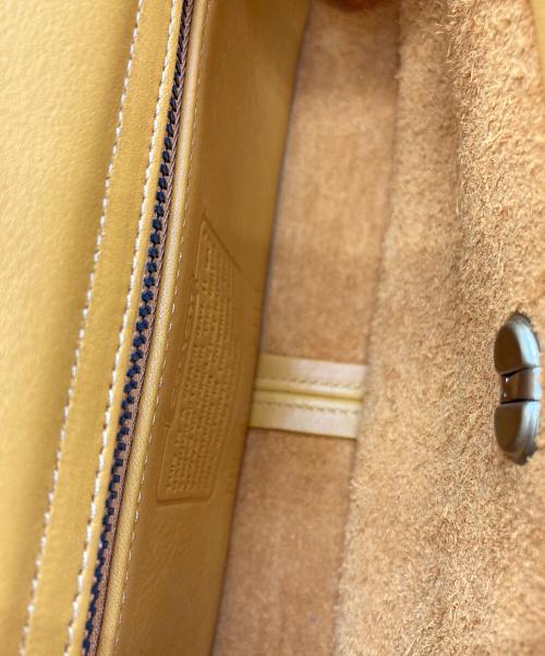 COACH（コーチ）COACH (コーチ) レザーターンロック2WAYバッグ マスタードの古着・服飾アイテム