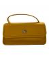 COACH（コーチ）の古着「レザーターンロック2WAYバッグ」｜マスタード