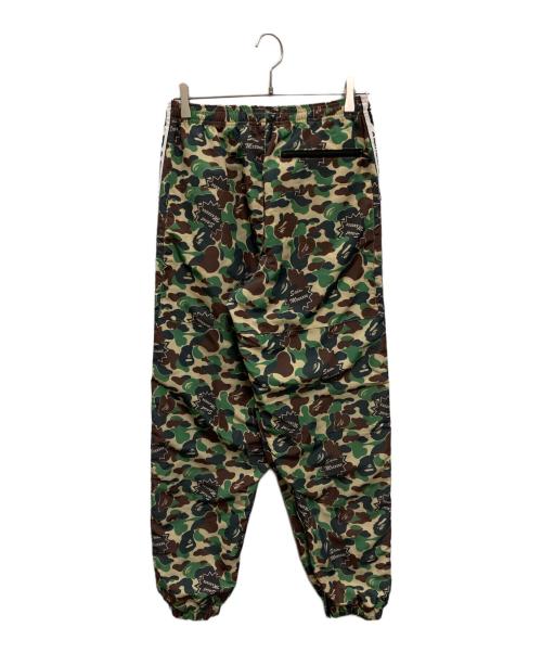 A BATHING APE（アベイシングエイプ）A BATHING APE (アベイシングエイプ) SAINT MICHAEL (セントマイケル) AP TRACK PNT / ST APE / CAMO グリーン サイズ:Sの古着・服飾アイテム