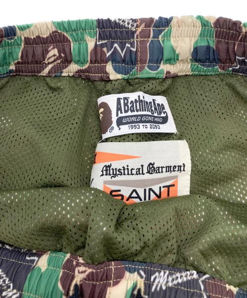 A BATHING APE（アベイシングエイプ）A BATHING APE (アベイシングエイプ) SAINT MICHAEL (セントマイケル) AP TRACK PNT / ST APE / CAMO グリーン サイズ:Sの古着・服飾アイテム