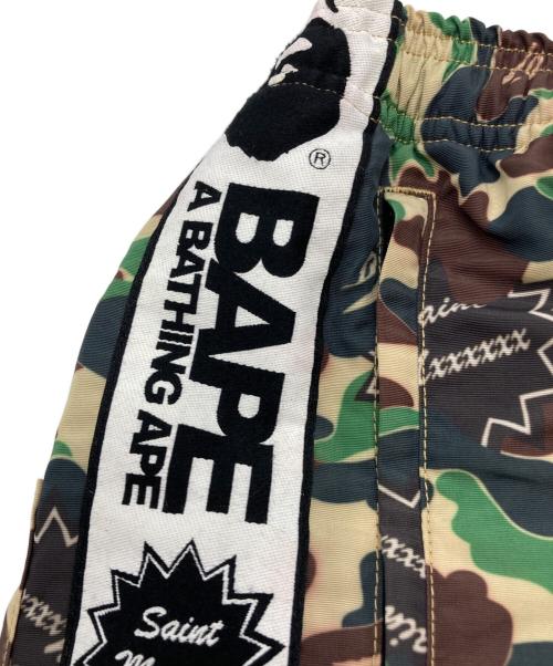 A BATHING APE（アベイシングエイプ）A BATHING APE (アベイシングエイプ) SAINT MICHAEL (セントマイケル) AP TRACK PNT / ST APE / CAMO グリーン サイズ:Sの古着・服飾アイテム