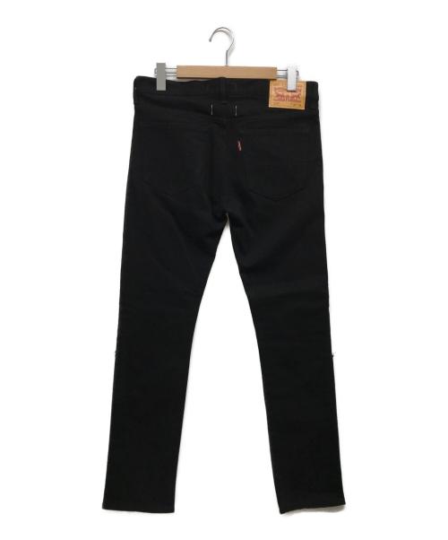 eYe COMME des GARCONS JUNYAWATANABE MAN（アイ コム デ ギャルソン ジュンヤ ワタナベ マン）eYe COMME des GARCONS JUNYAWATANABE MAN (コム デ ギャルソン ジュンヤ ワタナベ マン) LEVI'S (リーバイス) クラッシュニー加工デニムパンツ ブラック サイズ:w32の古着・服飾アイテム