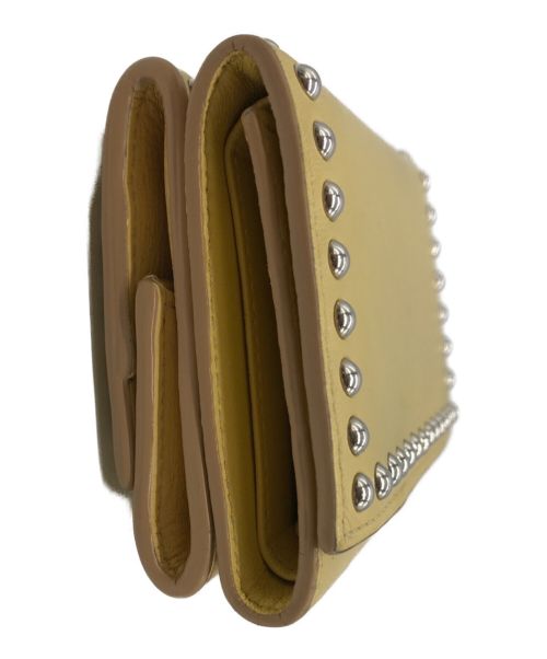 J&M DAVIDSON（ジェイ＆エム デヴィッドソン）J&M DAVIDSON (ジェイ＆エム デヴィッドソン) コンパクトウォレット イエローの古着・服飾アイテム