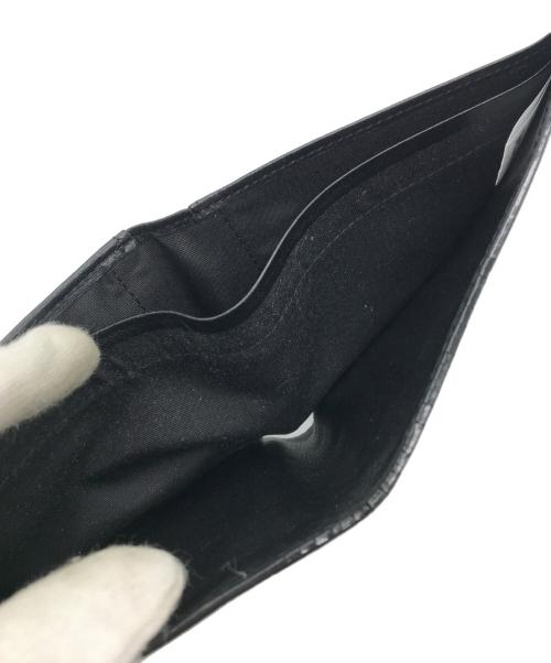 MCM（エムシーエム）MCM (エムシーエム) 2つ折り財布 ブラックの古着・服飾アイテム