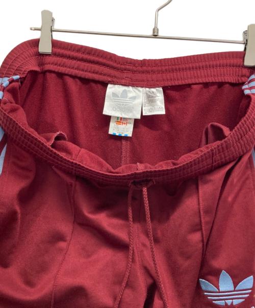 adidas（アディダス）adidas (アディダス) トラックパンツ レッド サイズ:Lの古着・服飾アイテム