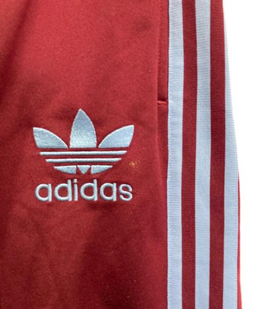 adidas（アディダス）adidas (アディダス) トラックパンツ レッド サイズ:Lの古着・服飾アイテム