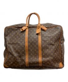 LOUIS VUITTON（ルイ ヴィトン）の古着「トラベルバッグ」｜ブラウン
