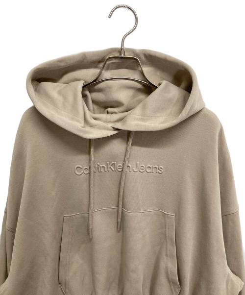 Calvin Klein Jeans（カルバンクラインジーンズ）Calvin Klein Jeans (カルバンクラインジーンズ) パーカー ベージュ サイズ:Mの古着・服飾アイテム