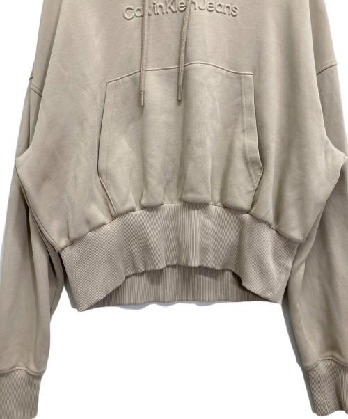 Calvin Klein Jeans（カルバンクラインジーンズ）Calvin Klein Jeans (カルバンクラインジーンズ) パーカー ベージュ サイズ:Mの古着・服飾アイテム