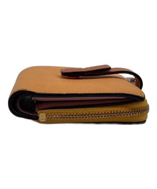 LOEWE（ロエベ）LOEWE (ロエベ) バーティカルウォレット オレンジの古着・服飾アイテム