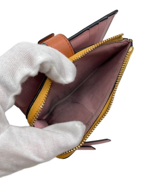 LOEWE（ロエベ）LOEWE (ロエベ) バーティカルウォレット オレンジの古着・服飾アイテム