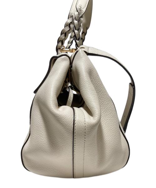 TORY BURCH（トリーバーチ）TORY BURCH (トリーバーチ) ハーフムーンスモールサッチェルバッグ アイボリーの古着・服飾アイテム