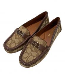 COACH（コーチ）の古着「モナ ドライバーシグネチャージャガード」｜ブラウン