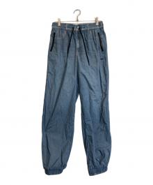 DIESEL（ディーゼル）の古着「デニムプリントナイロンパンツ」｜インディゴ