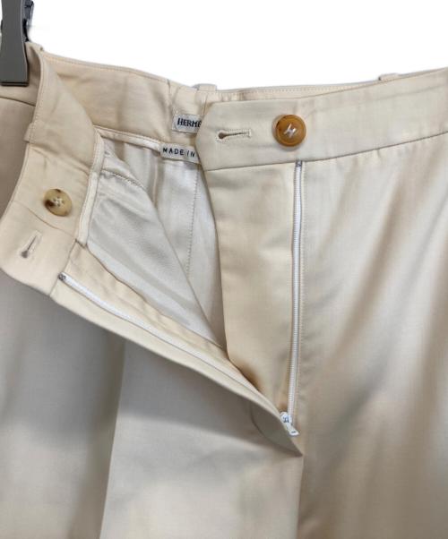 HERMES（エルメス）HERMES (エルメス) Hボタンスラックス ベージュ サイズ:40の古着・服飾アイテム