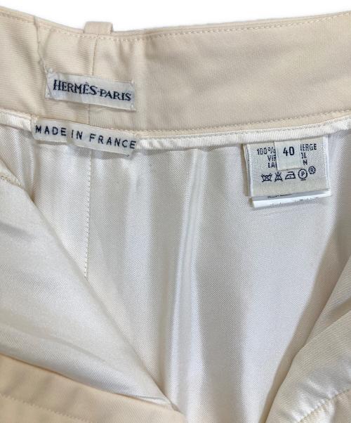 HERMES（エルメス）HERMES (エルメス) Hボタンスラックス ベージュ サイズ:40の古着・服飾アイテム