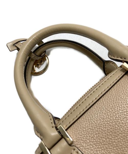 MICHAEL KORS（マイケルコース）MICHAEL KORS (マイケルコース) 2WAYバッグ ベージュの古着・服飾アイテム