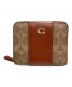 COACH（コーチ）の古着「ビルフォールド ウォレット カラーブロック シグネチャー」｜ブラウン