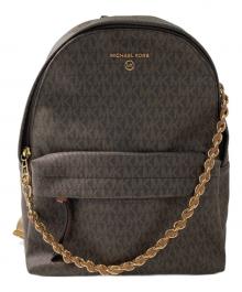 MICHAEL KORS（マイケルコース）の古着「モノグラムリュック」｜ブラウン