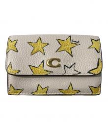 COACH（コーチ）の古着「エッセンシャル ミニ トライフォード ウォレット スター プリント　M2477」｜アイボリー
