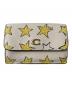 COACH（コーチ）の古着「エッセンシャル ミニ トライフォード ウォレット スター プリント　M2477」｜アイボリー