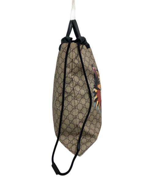 GUCCI（グッチ）GUCCI (グッチ) GGスプリーム ドローストリング タイガーヘッド ナップサック ベージュの古着・服飾アイテム