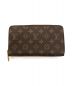 LOUIS VUITTON（ルイヴィトン）の古着「ラウンドファスナーウォレット」｜ブラウン