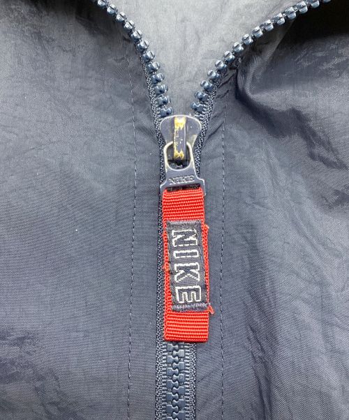 NIKE（ナイキ）NIKE (ナイキ) 古着バックビッグスウォッシュナイロンジャケット　刺繍タグ　90S 　バイカラー ネイビー×レッド サイズ:XL(BOYS)の古着・服飾アイテム