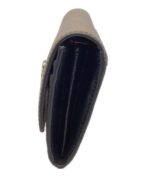 FURLA（フルラ）FURLA (フルラ) CONTINENTAL WALLET / コンチネンタルウォレット　長財布　ターンロック　バイカラー ピンクベージュ×ブラックの古着・服飾アイテム