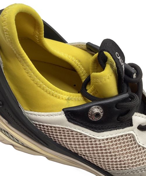 Calvin Klein（カルバンクライン）Calvin Klein (カルバンクライン) CARLOS 10スニーカー ベージュ×イエロー サイズ:28の古着・服飾アイテム