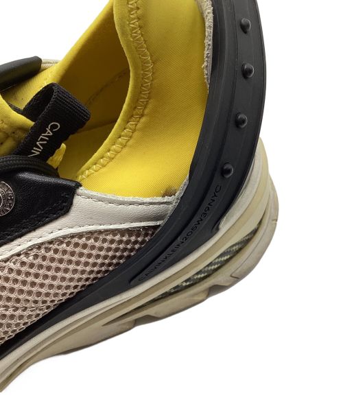 Calvin Klein（カルバンクライン）Calvin Klein (カルバンクライン) CARLOS 10スニーカー ベージュ×イエロー サイズ:28の古着・服飾アイテム