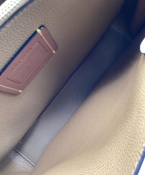 COACH（コーチ）COACH (コーチ) タイラーキャリーオール　2WAY　ハンドバッグ　ショルダーバッグ アイボリーの古着・服飾アイテム