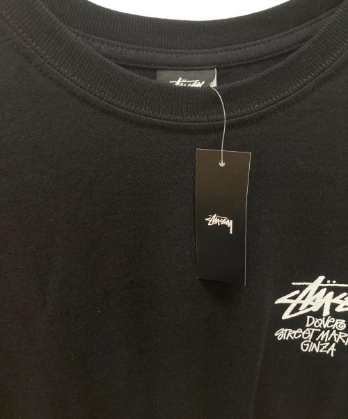 stussy（ステューシー）stussy (ステューシー) DOVER STREET MARKET (ドーバー ストリート マーケット) コラボロゴプリントTシャツ ブラック サイズ:XL 未使用品の古着・服飾アイテム